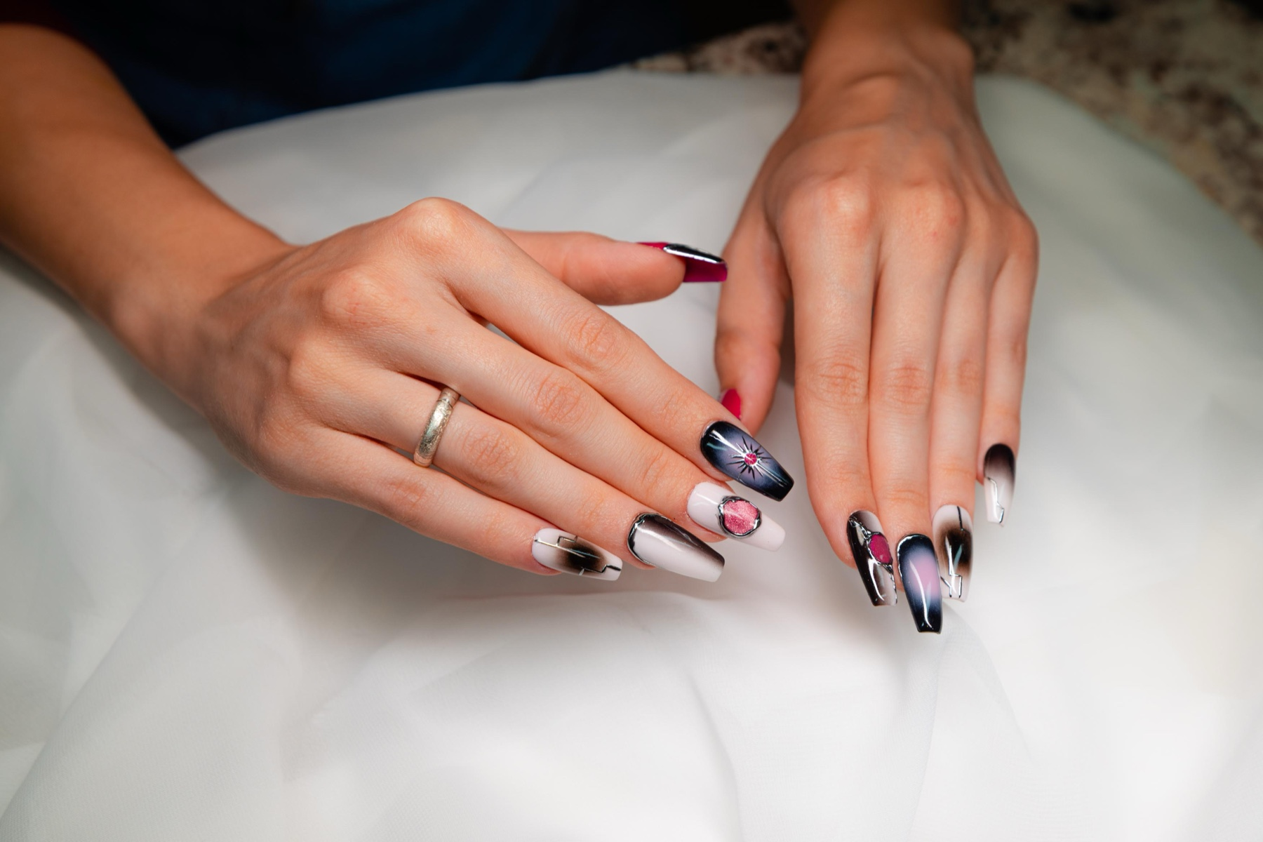Detailed neutral nail art created by New Style Nail Spa